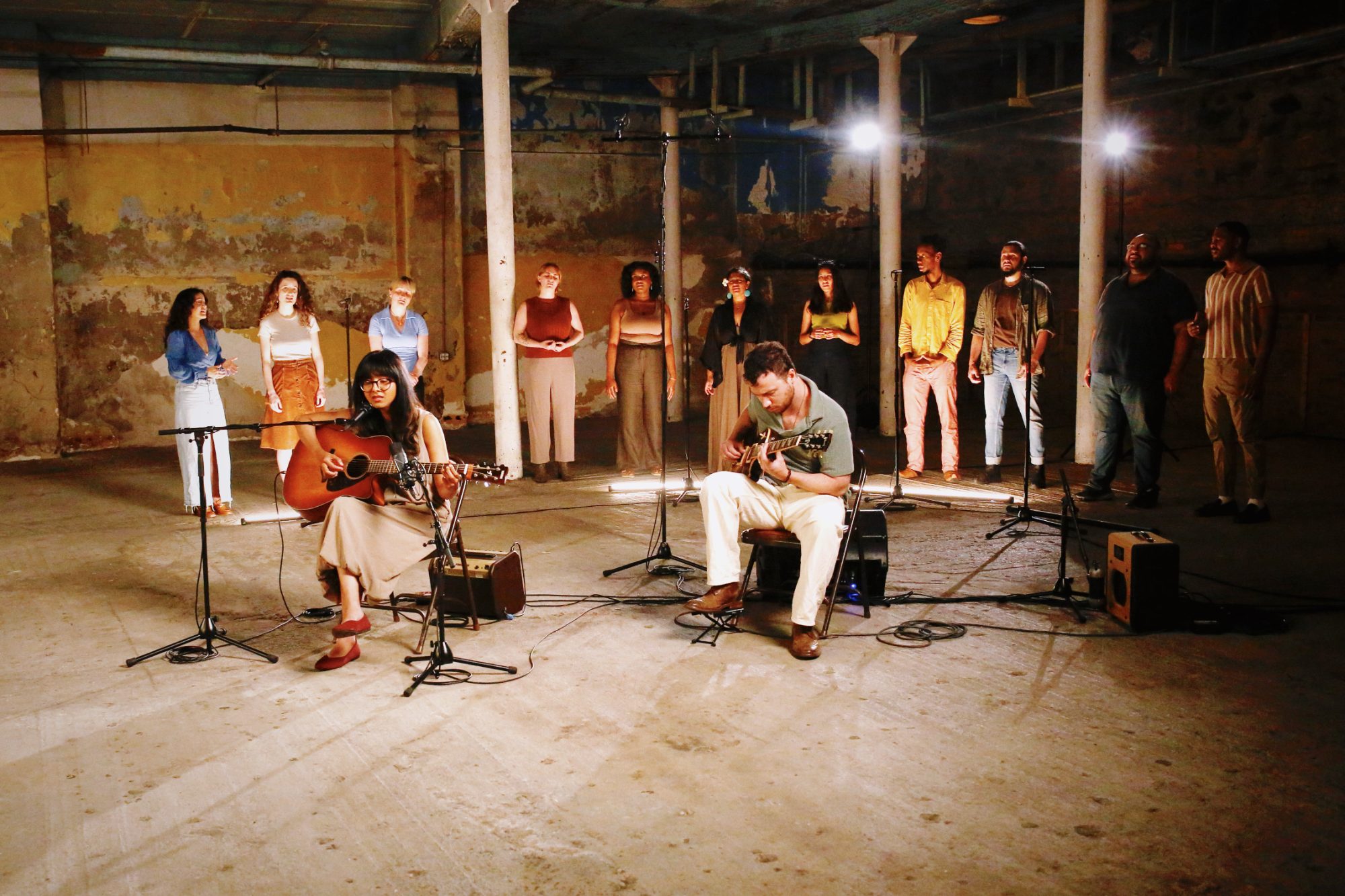 Shakthisree Gopalan and a circle of singers during the filmed live recording of Old Friend in a Brooklyn warehouse